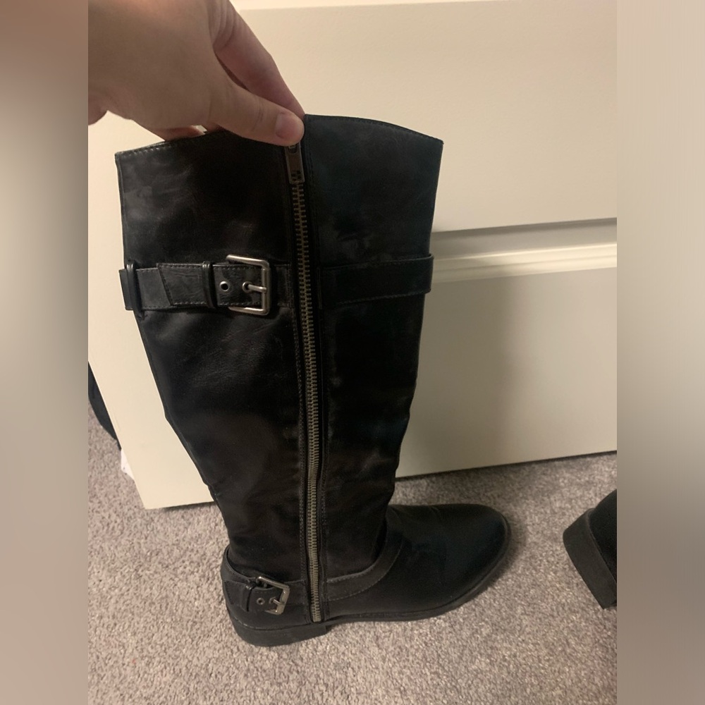 maybe worn once. Black mid- thigh Biker Boots.